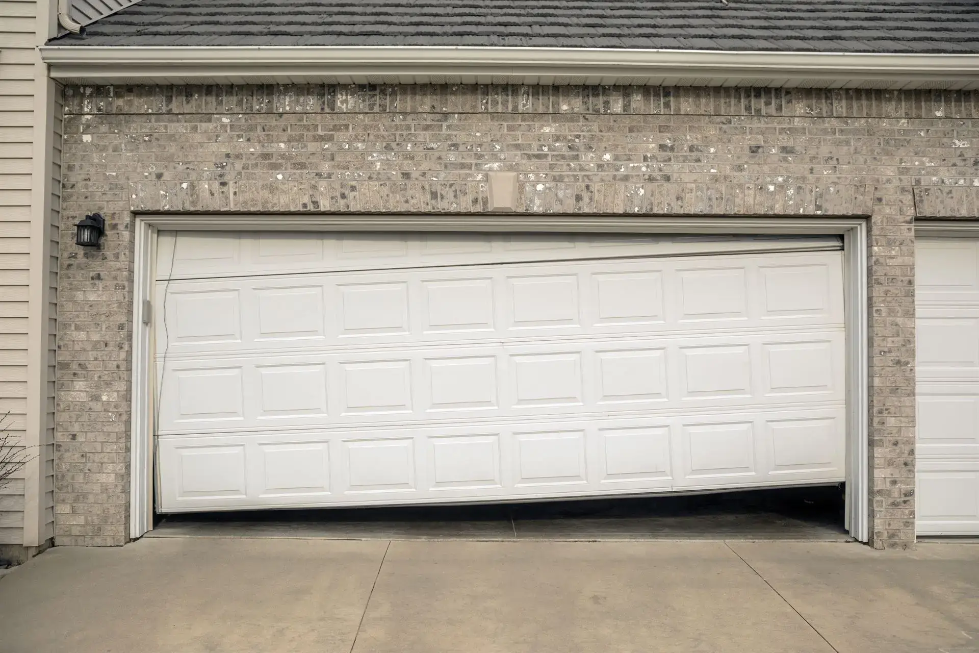 Your Door Won’t Be Stuck Again garage-door-stops-moving-from-one-side